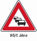 Torlódás veszélyre figyelmeztető tábla